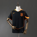 Camiseta Corinthians 25/26, color negro y naranja.
